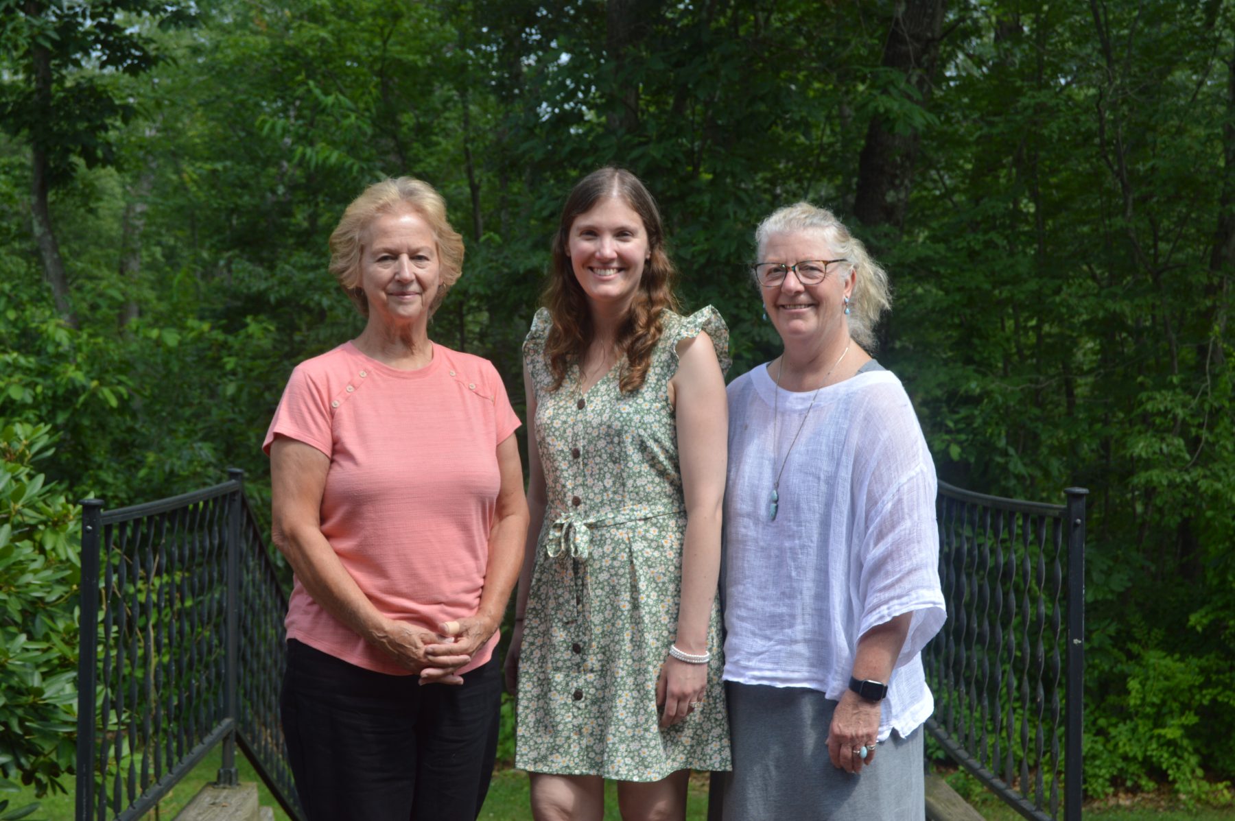 (Left to right) Kathleen Augustine, Melissa Hatch, and Susan Arnold standing outside.