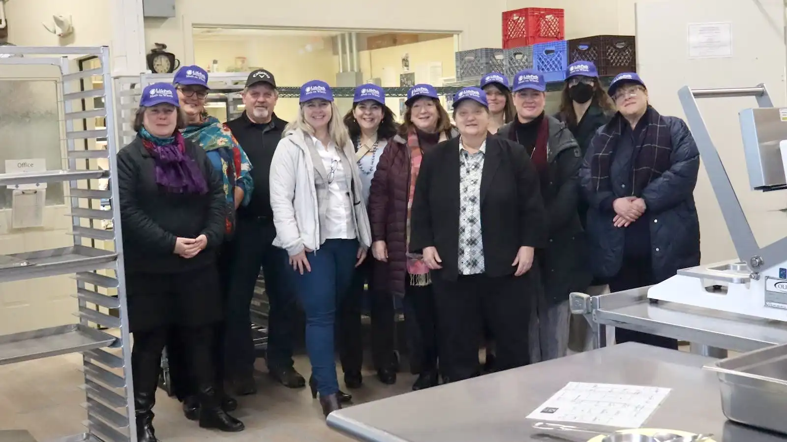 Visitors to the Meals on Wheels kitchen