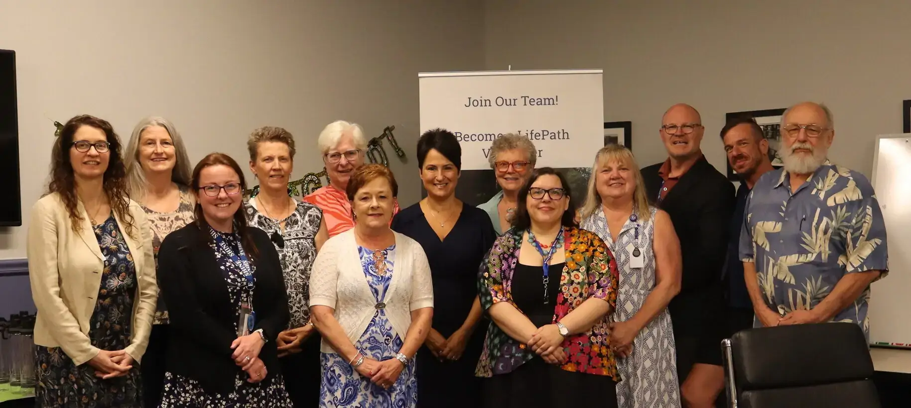 group of SHINE graduates and staff smiling