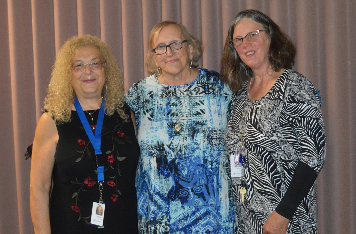 Molly Chambers (middle) at a celebration of her 30 years of service, with Barbara Bodzin, Executive Director (left) and Diane Robie, Director of Client Services (right).