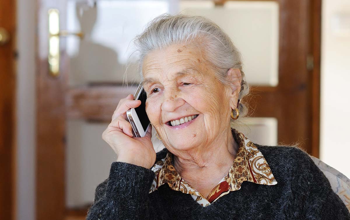 smiling older woman on phone