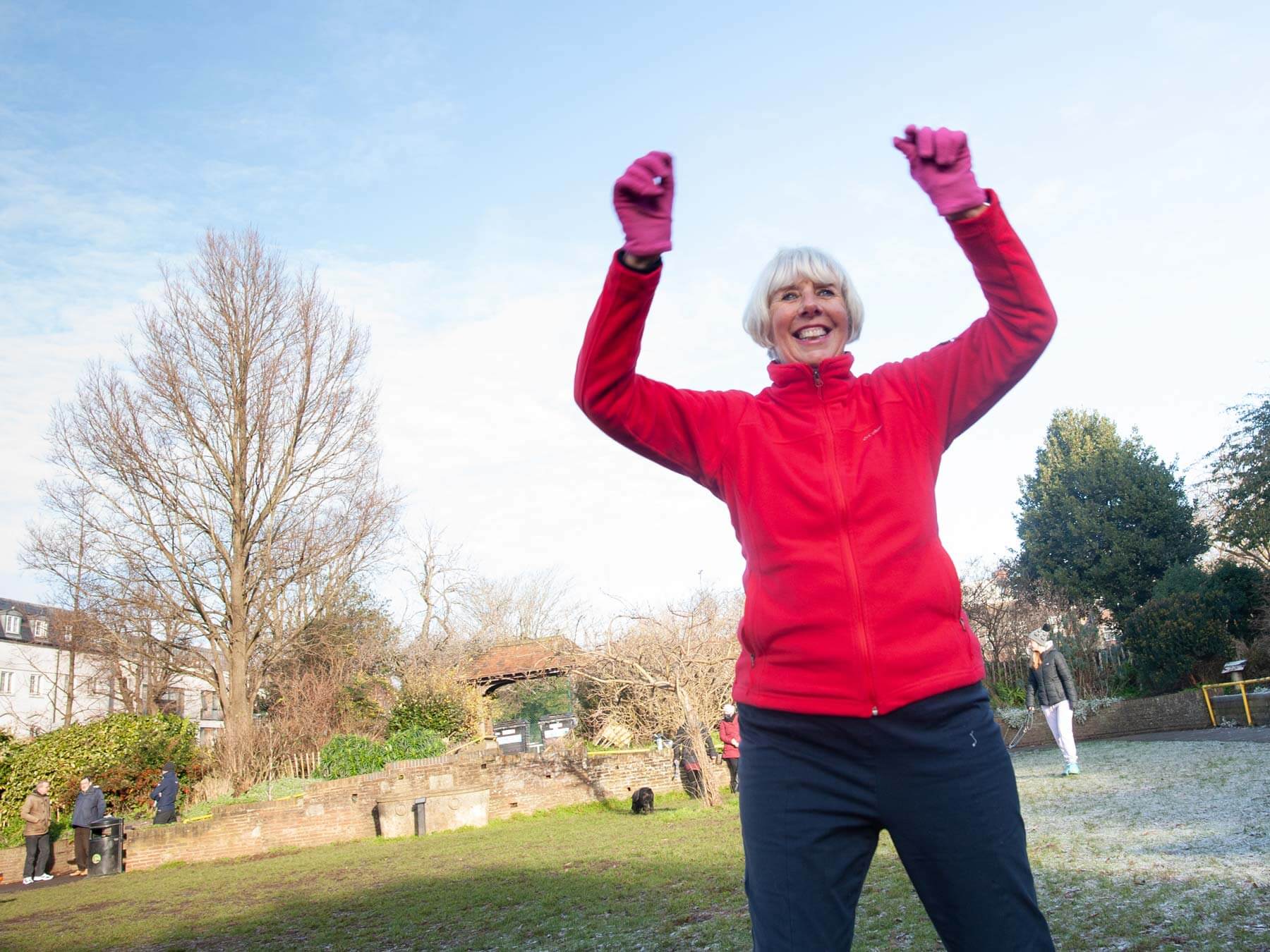 A woman exercises outdoors in the winter